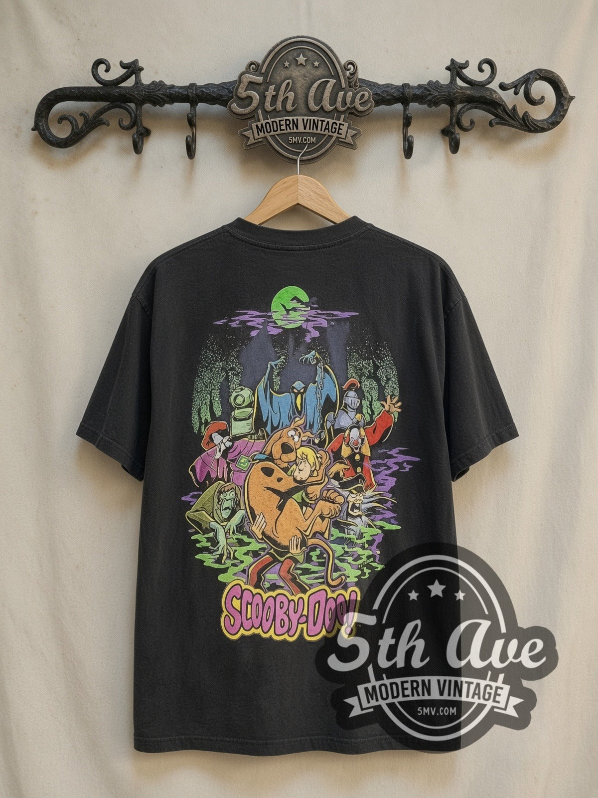 Scooby-Doo Haunted Mansion vintage cartoon tee in black, back view on a display rack