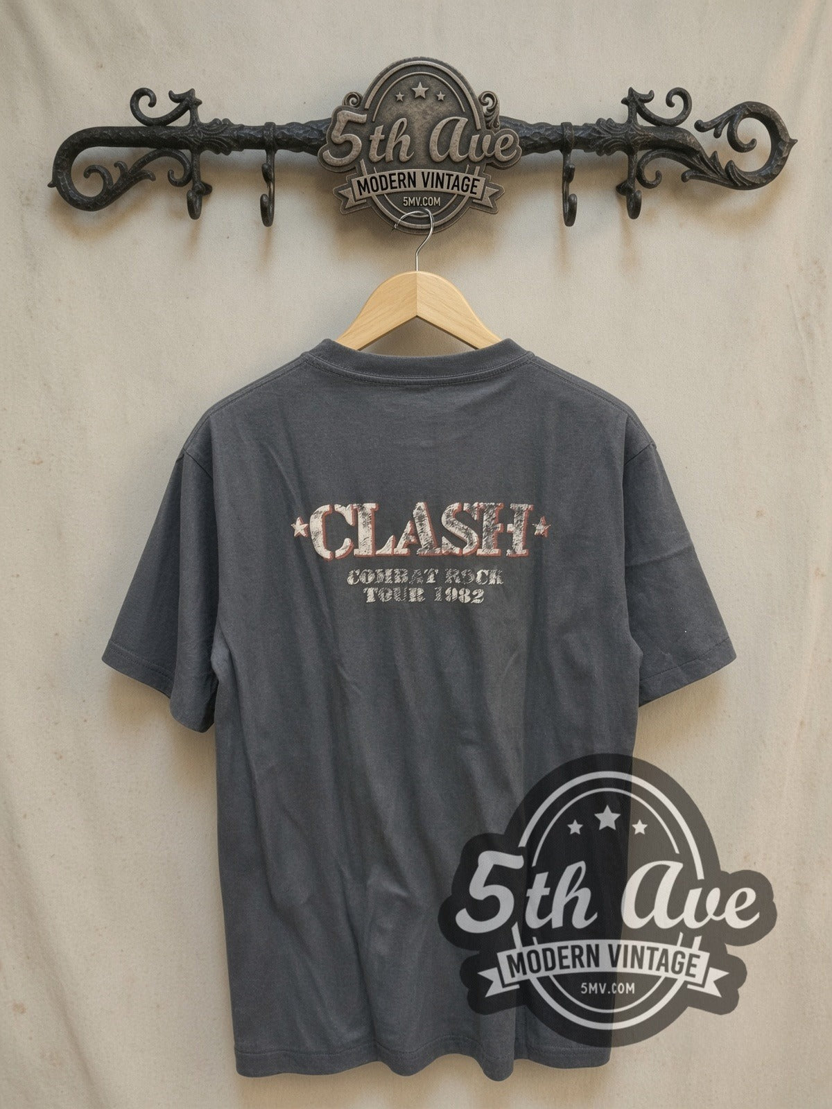 The Clash vintage band t-shirt, back view on a display rack