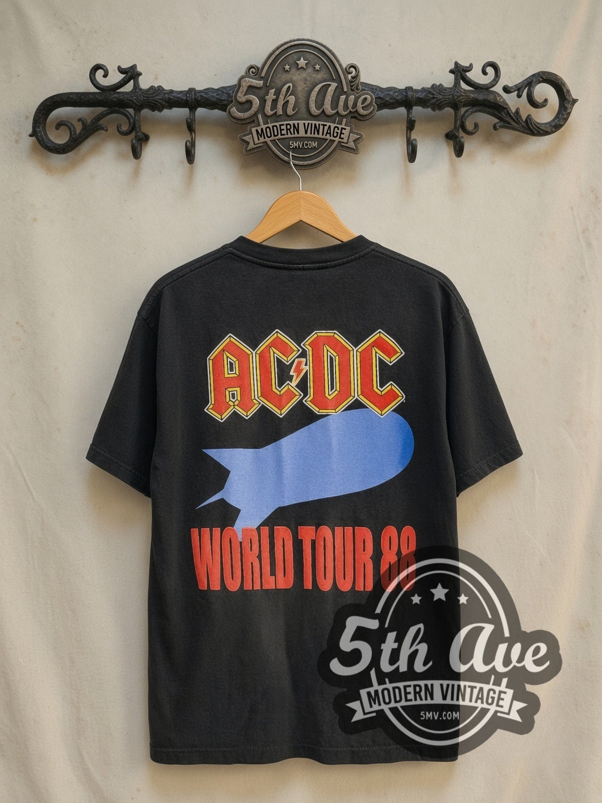 AC/DC Blow Up Your Video Red Rocket Blimp vintage band t-shirt in black, back view on a display rack
