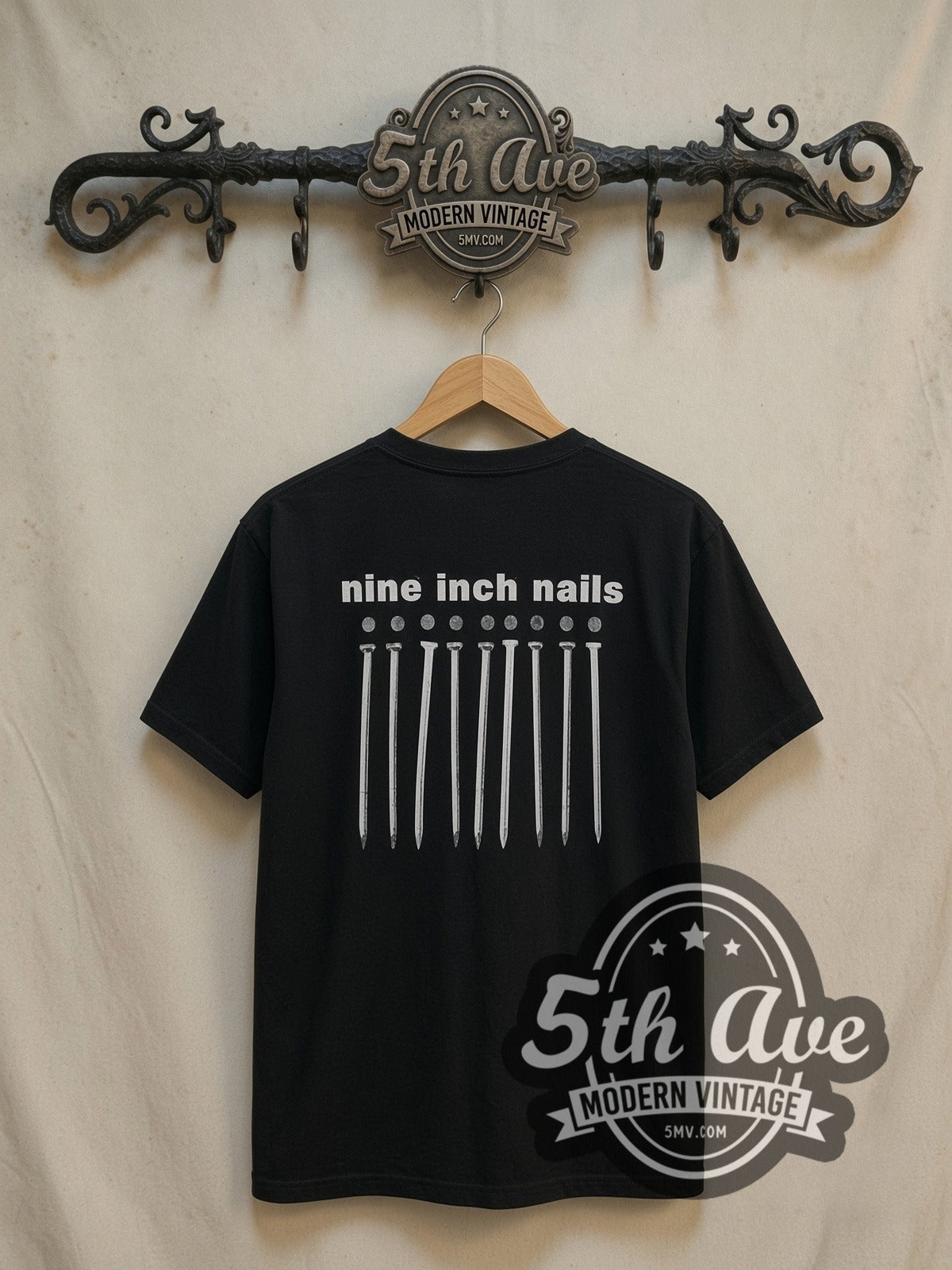 Nine Inch Nails vintage band t-shirt, back view on a display rack