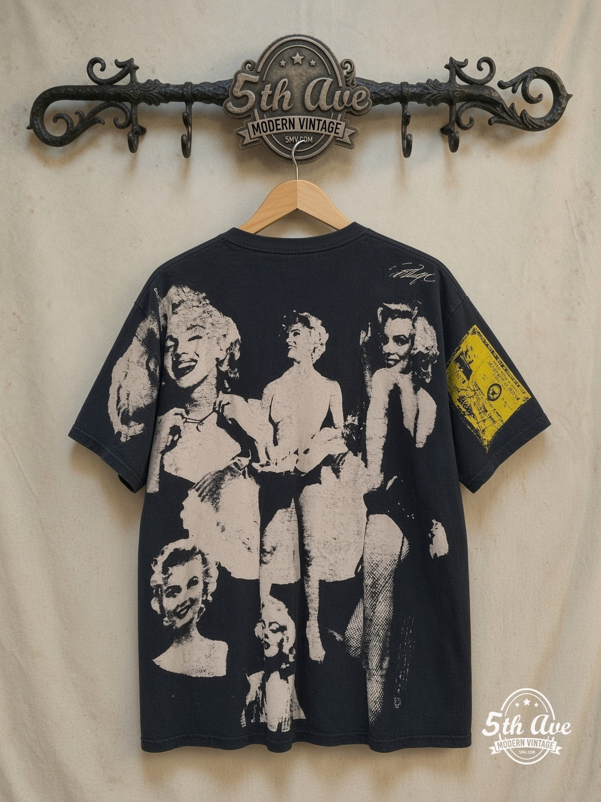 Marilyn Monroe – AOP all over print New Vintage T-Shirt – Vintage Graphic Tee — back on locked cream ornate 5th Ave rack