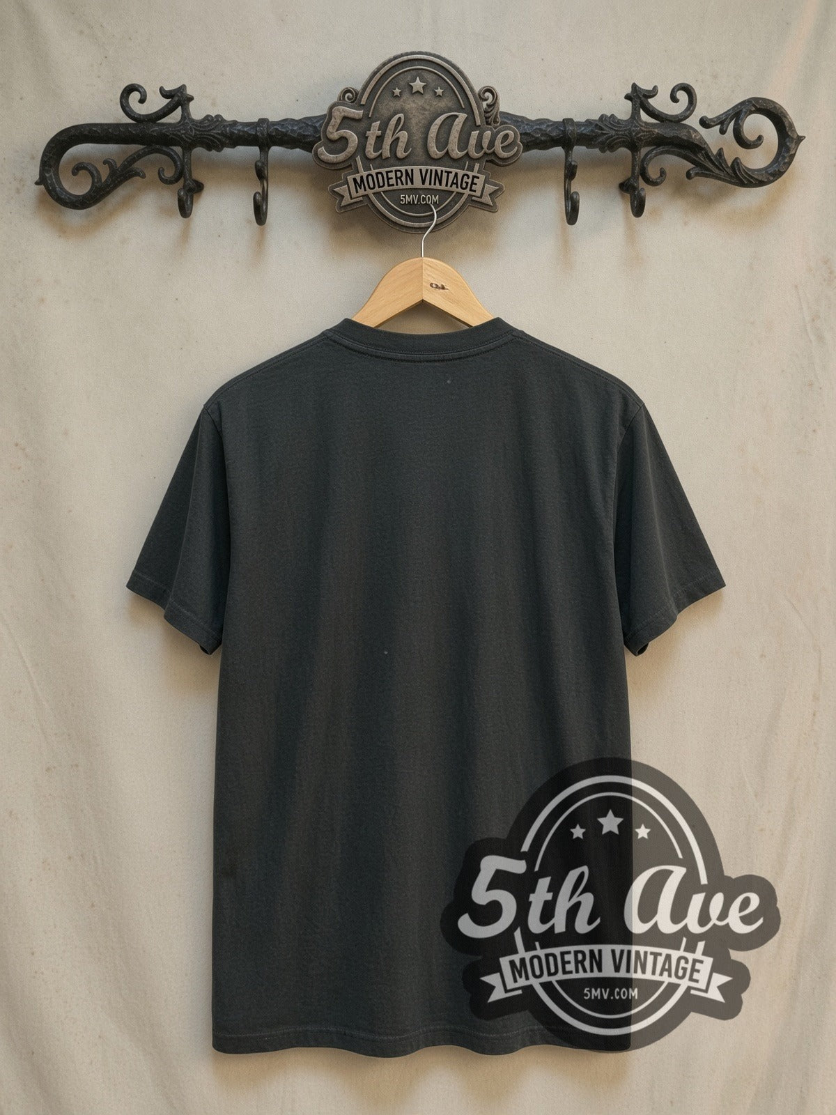 The Smiths Meat Is Murder vintage band t-shirt, back view on a display rack