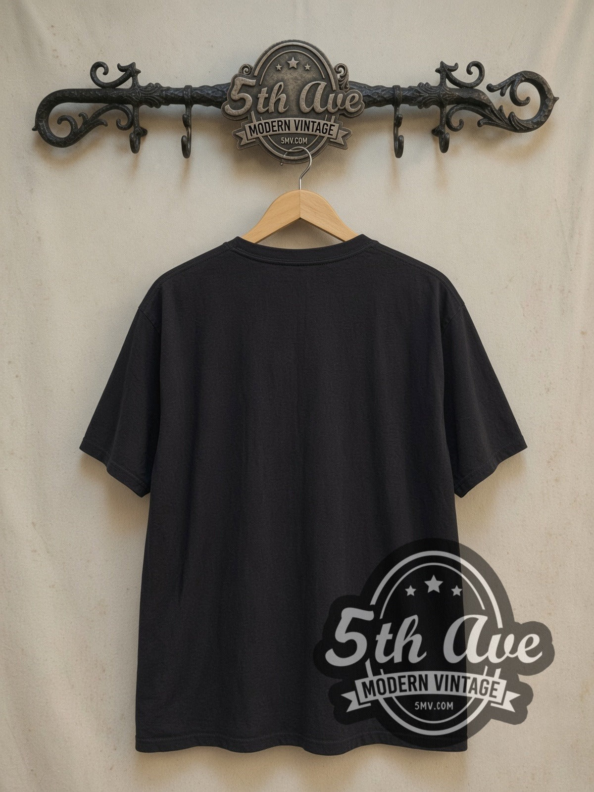 Oasis Be Here Now vintage band t-shirt, back view on a display rack