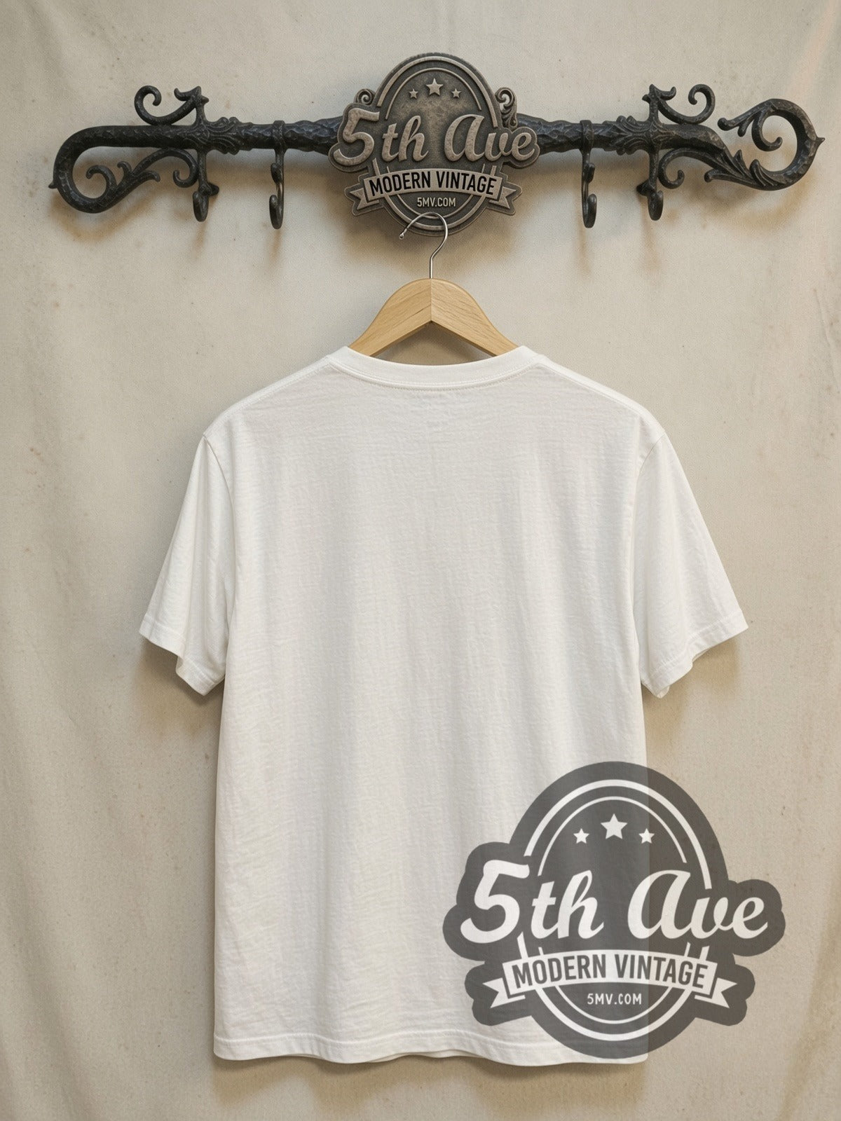 Queen Freddie Mercury vintage band t-shirt, back view on a display rack