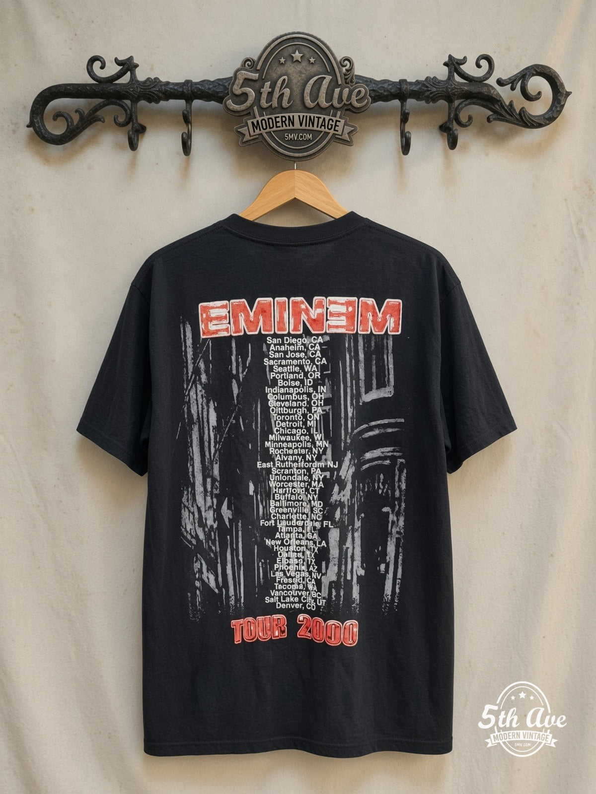 Eminem – Anger Management Tour "EMINƎM – Vintage Band T-Shirt — back on locked cream ornate 5th Ave rack