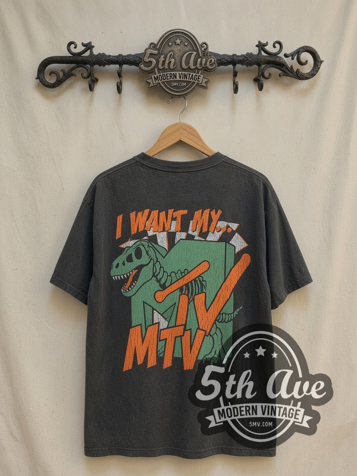 MTV I Want My MTV vintage graphic tee in black, back view on a display rack