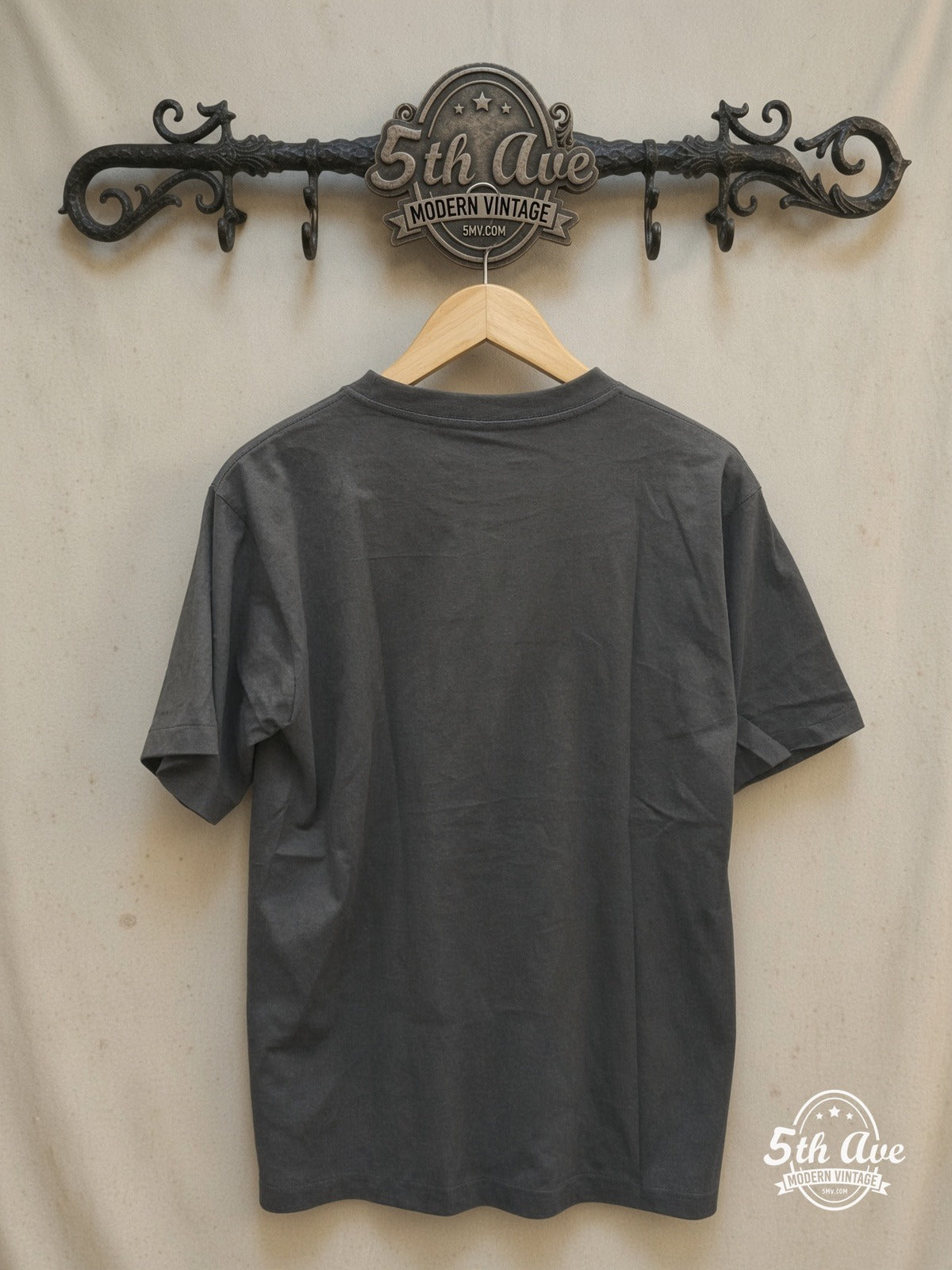 Resonant Echoes: Sabbath Bloody Sabbath Distressed t shirt – Vintage Band T-Shirt — back on locked cream ornate 5th Ave rack
