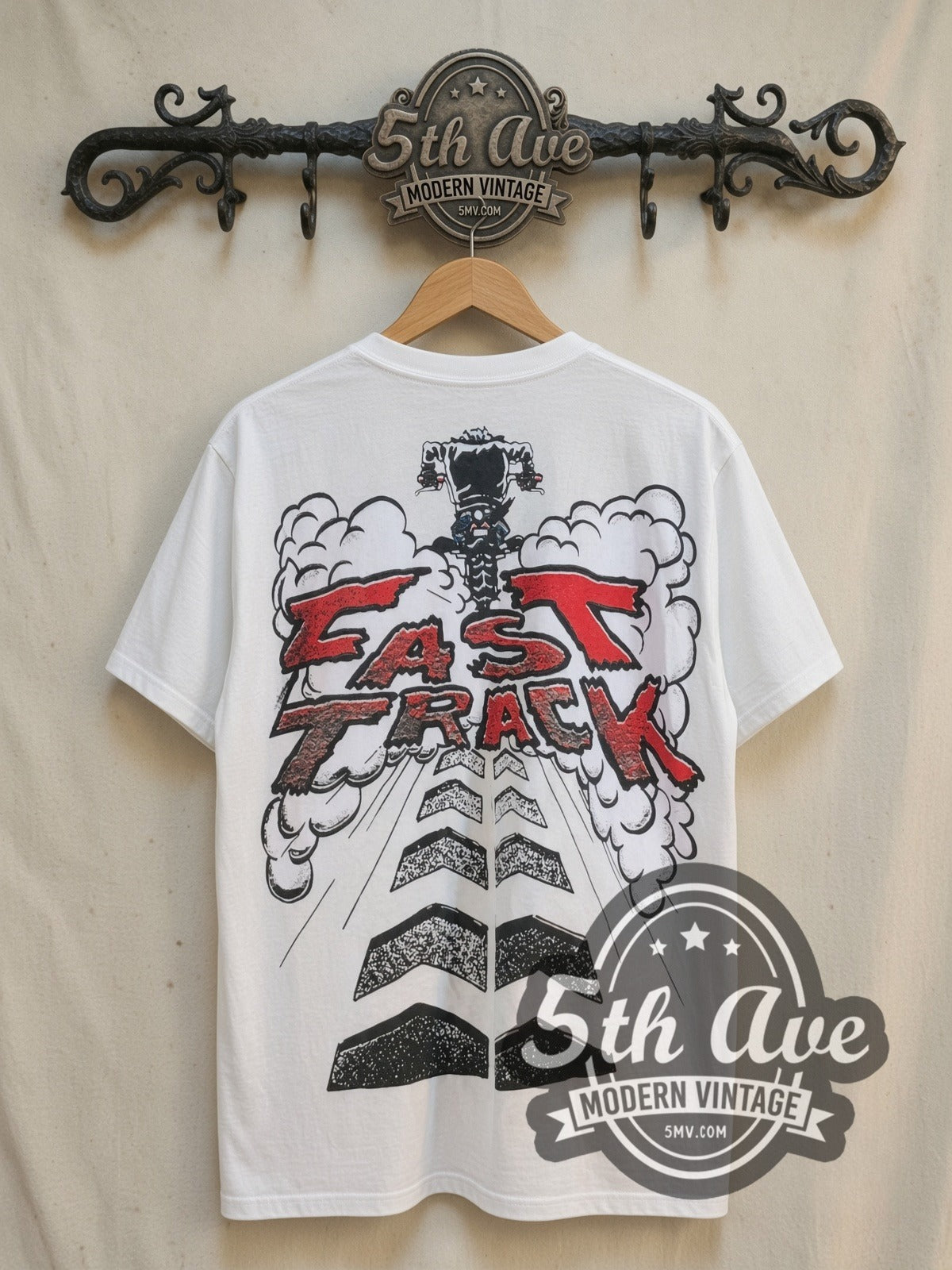 Looney Tunes Taz-Mania Fast Track all-over-print vintage cartoon tee, back view on a display rack