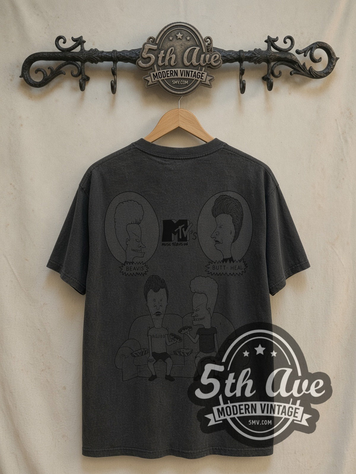 AC/DC MTV Beavis and Butthead Rock vintage band t-shirt, back view on a display rack