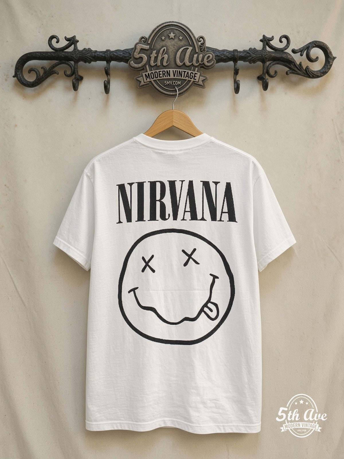 Nirvana – Nevermind Smiley – Vintage Band T-Shirt — back on locked cream ornate 5th Ave rack