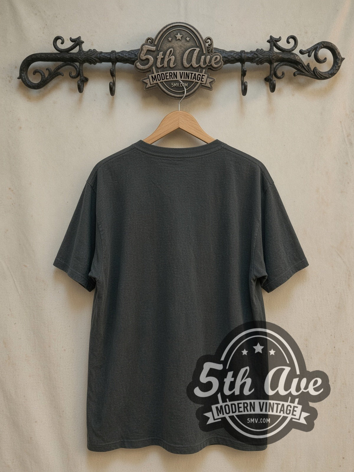 Joy Division Unknown Pleasures Pulsar Wave vintage band t-shirt, back view on a display rack