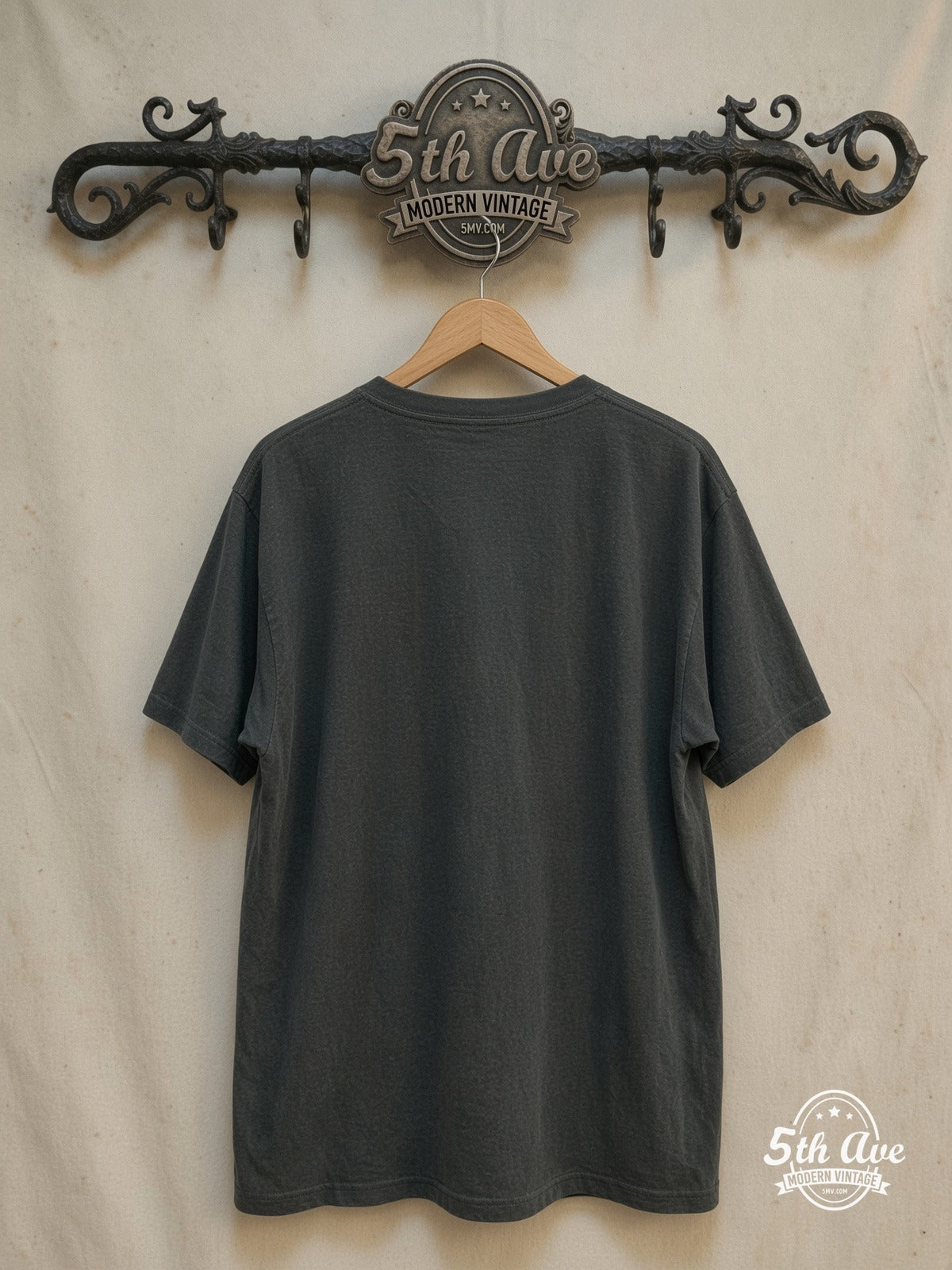 Joy Division – Unknown Pleasures Pulsar Wave – Vintage Band T-Shirt — back on locked cream ornate 5th Ave rack