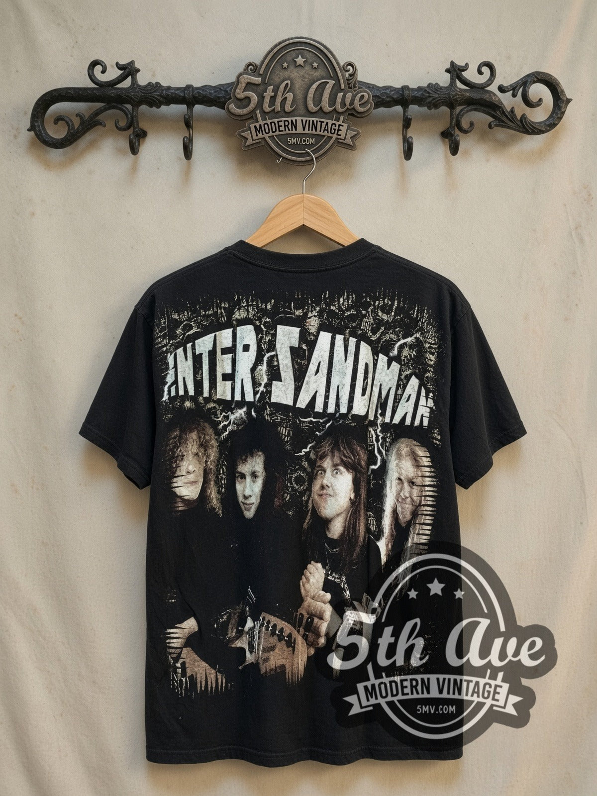 Metallica Enter Sandman all-over-print vintage band t-shirt, back view on a display rack