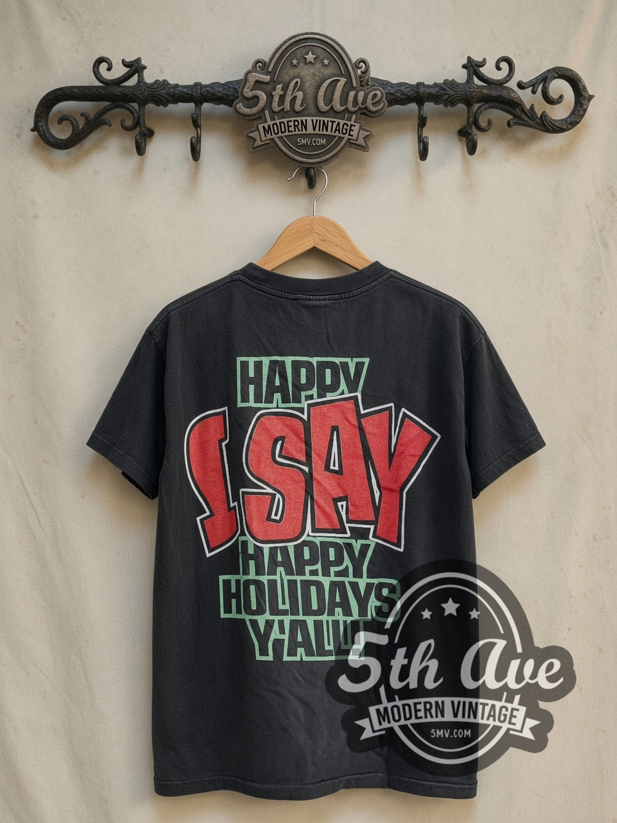 Looney Tunes Foghorn Leghorn Happy Holidays vintage cartoon tee in black, back view on a display rack