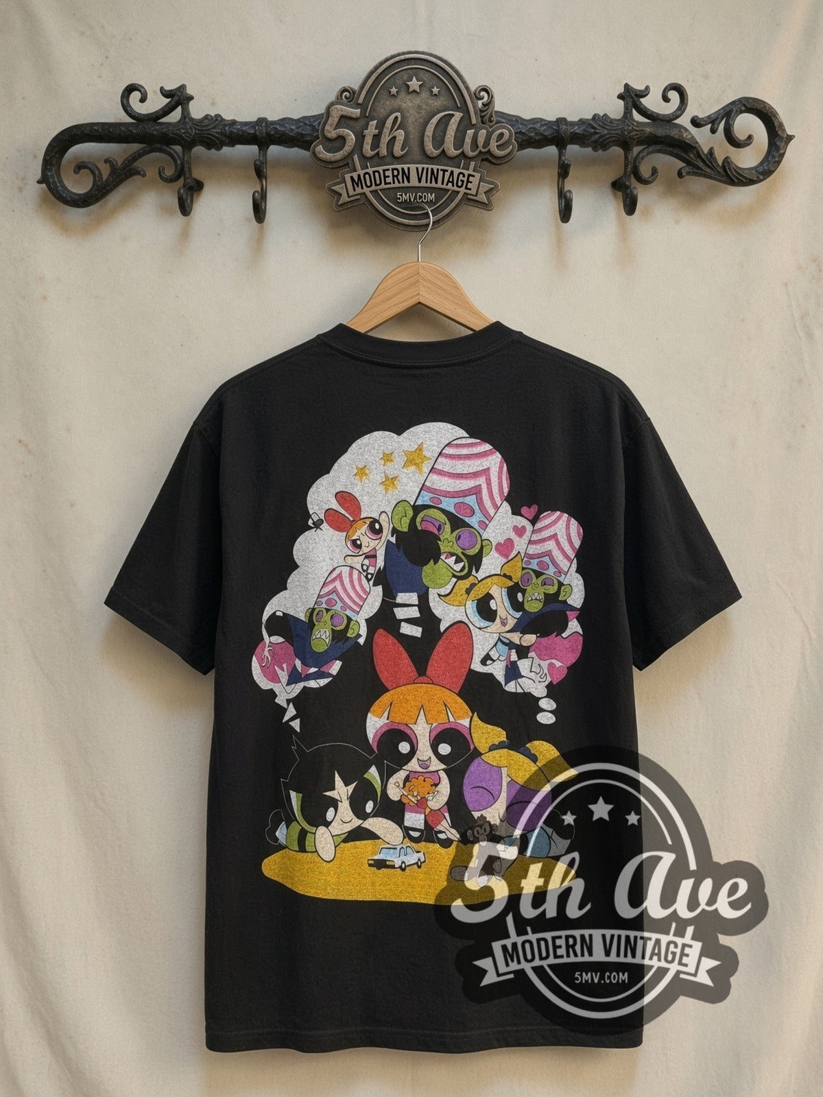 The Powerpuff Girls Vs. Mojo Jojo graphic tee in black, back view on a display rack