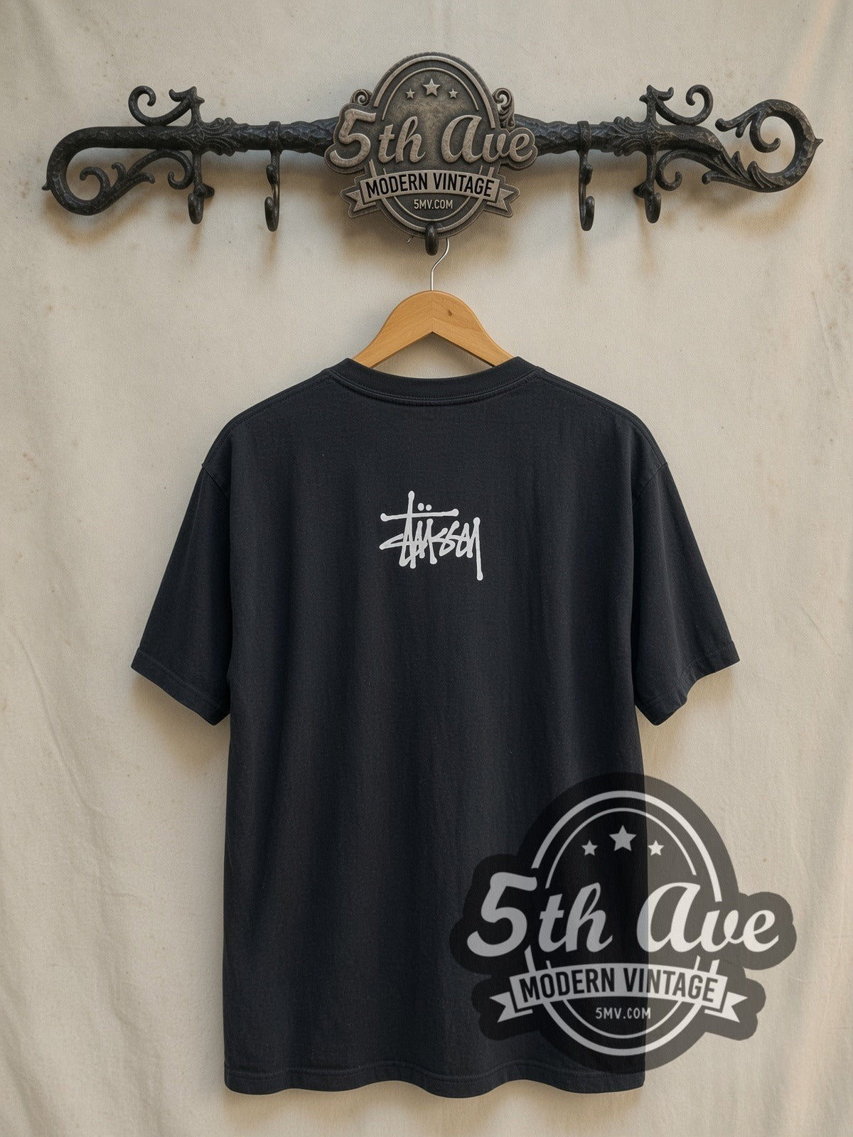 Sade Smooth Operator Four Portrait Grid vintage band tee in black, back view on a display rack