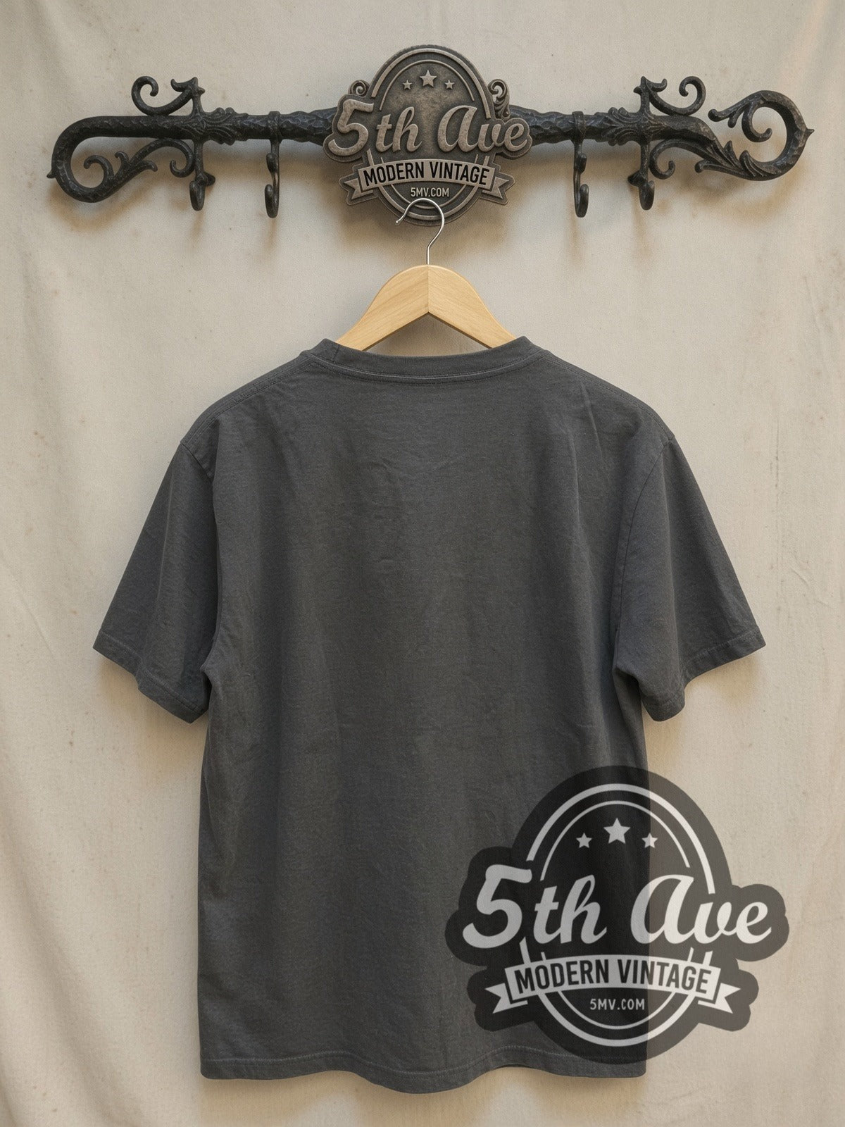 Led Zeppelin USA 1977 Icarus Logo vintage band t-shirt, back view on a display rack