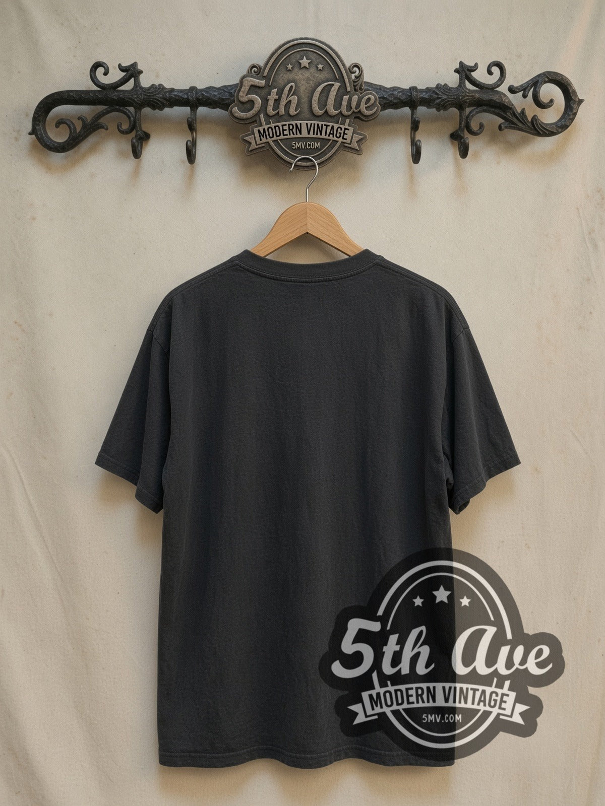 Motörhead Two-Headed Eagle Snaggletooth vintage band t-shirt, back view on a display rack