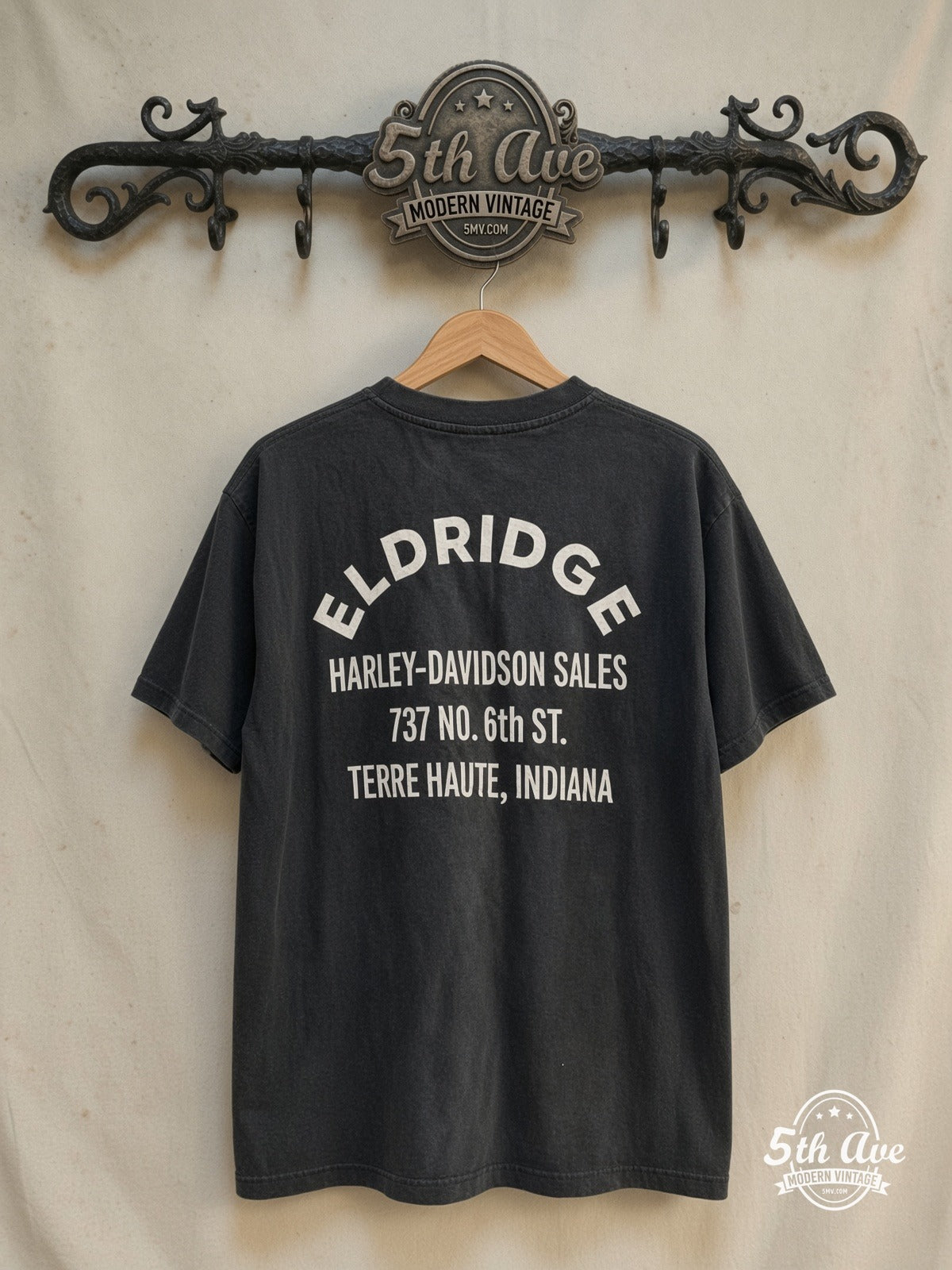 Harley-Davidson – Eldridge Terre Haute – Vintage Graphic Tee back on locked cream ornate 5th Ave rack