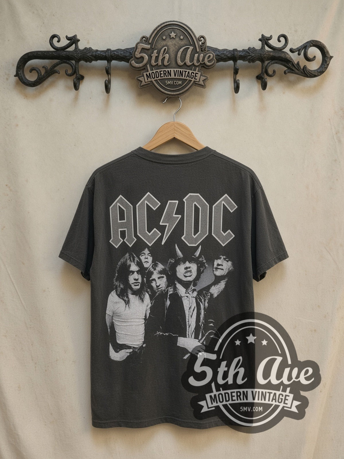 AC/DC Rock Legends vintage band t-shirt, back view on a display rack