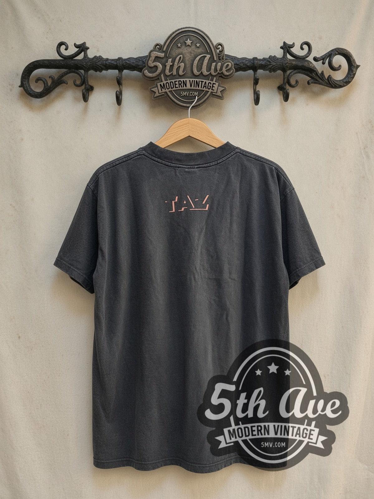 Looney Tunes Taz-Mania vintage cartoon tee in black, back view on a display rack