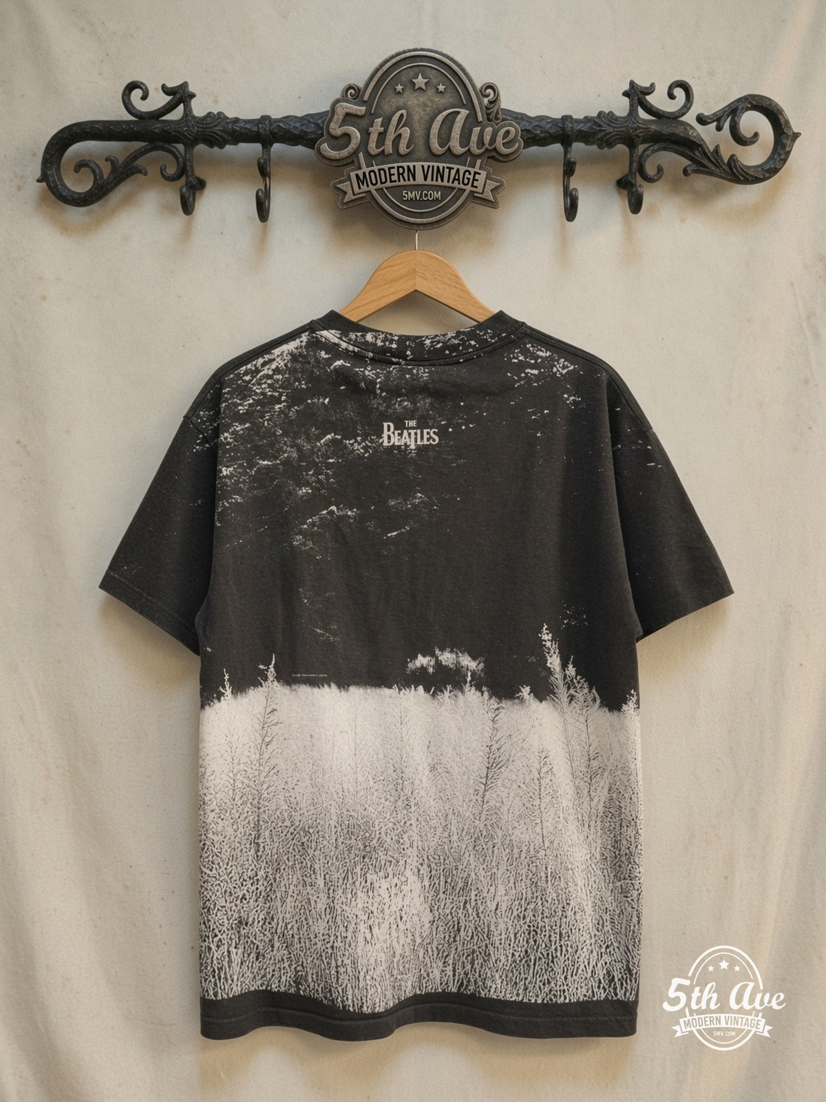The Beatles – Field of Grass 1995 – All Over Print – Vintage Band T-Shirt — back on locked cream ornate 5th Ave rack