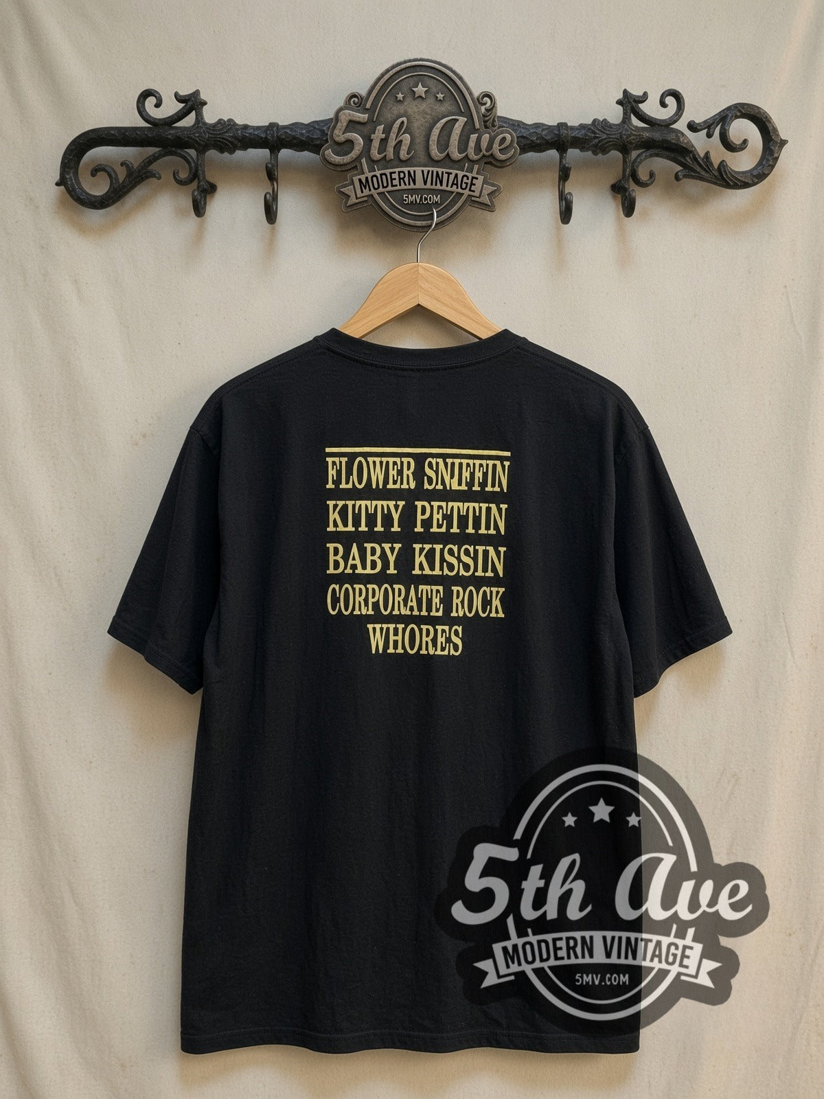 Nirvana Classic Yellow Smiley Face Logo vintage band t-shirt, back view on the 5MV rack
