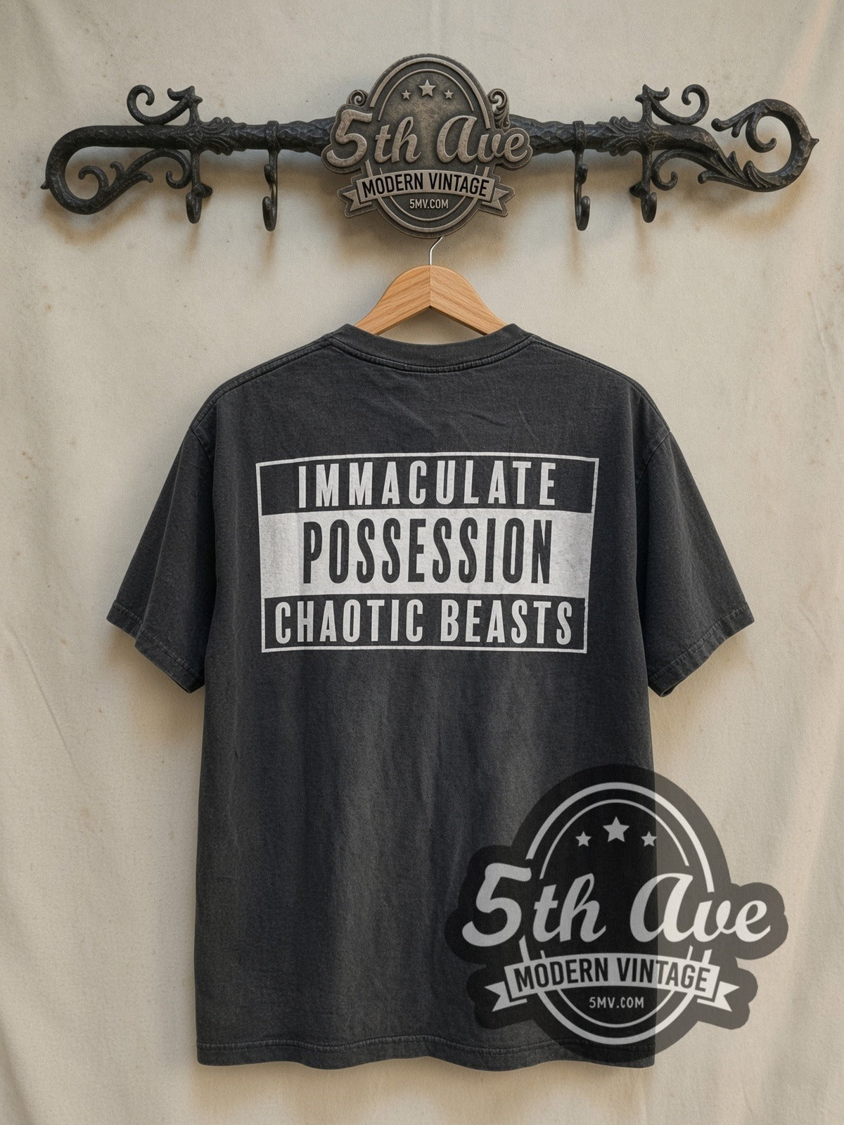Cactus Plant Flea Market Headshot vintage graphic tee in black, back view on the 5MV rack