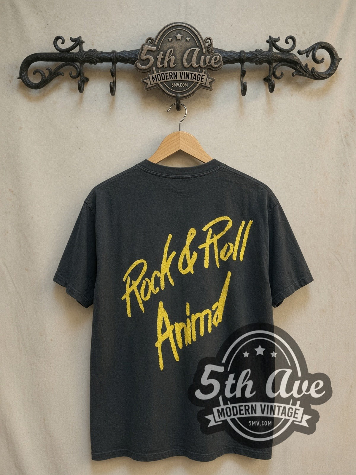 Lou Reed Rock 'n' Roll Animal' Distressed Cotton vintage band t-shirt, back view on a display rack