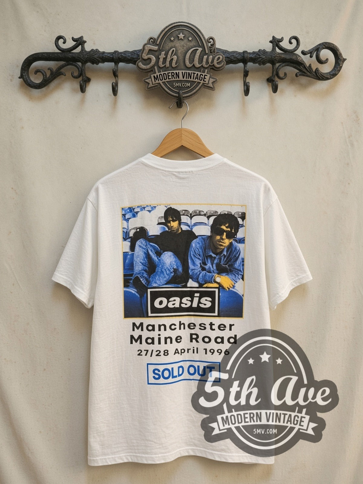 Oasis (What's the Story) Morning Glory? Tour 1996 vintage band t-shirt in white, back view on a display rack