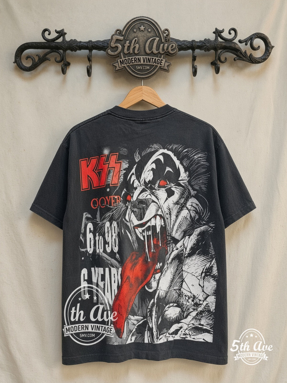 KISS – Destroyer 22 Years of Destruction \m/KIϟϟ\m/ – All Over Print – Vintage Band T-Shirt — back on locked cream ornate 5th Ave rack