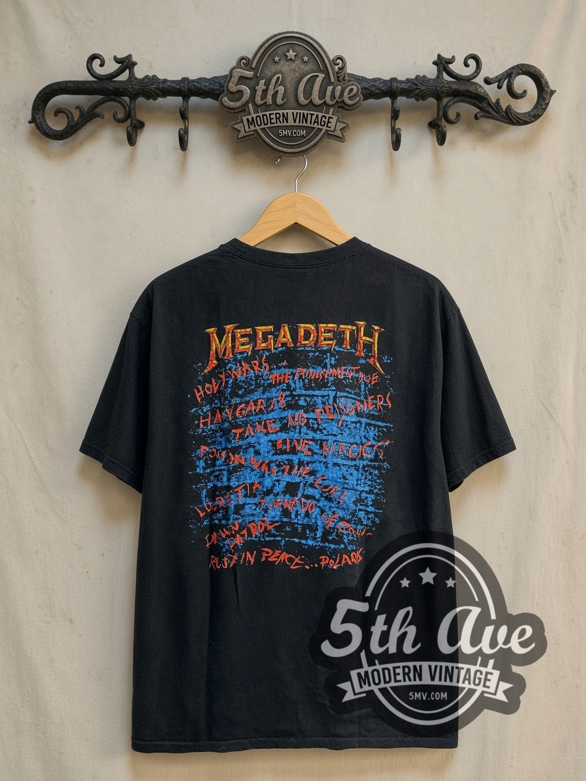 Megadeth Rust in Peace Vic Searchlights Tracklist vintage band t-shirt, back view on a display rack