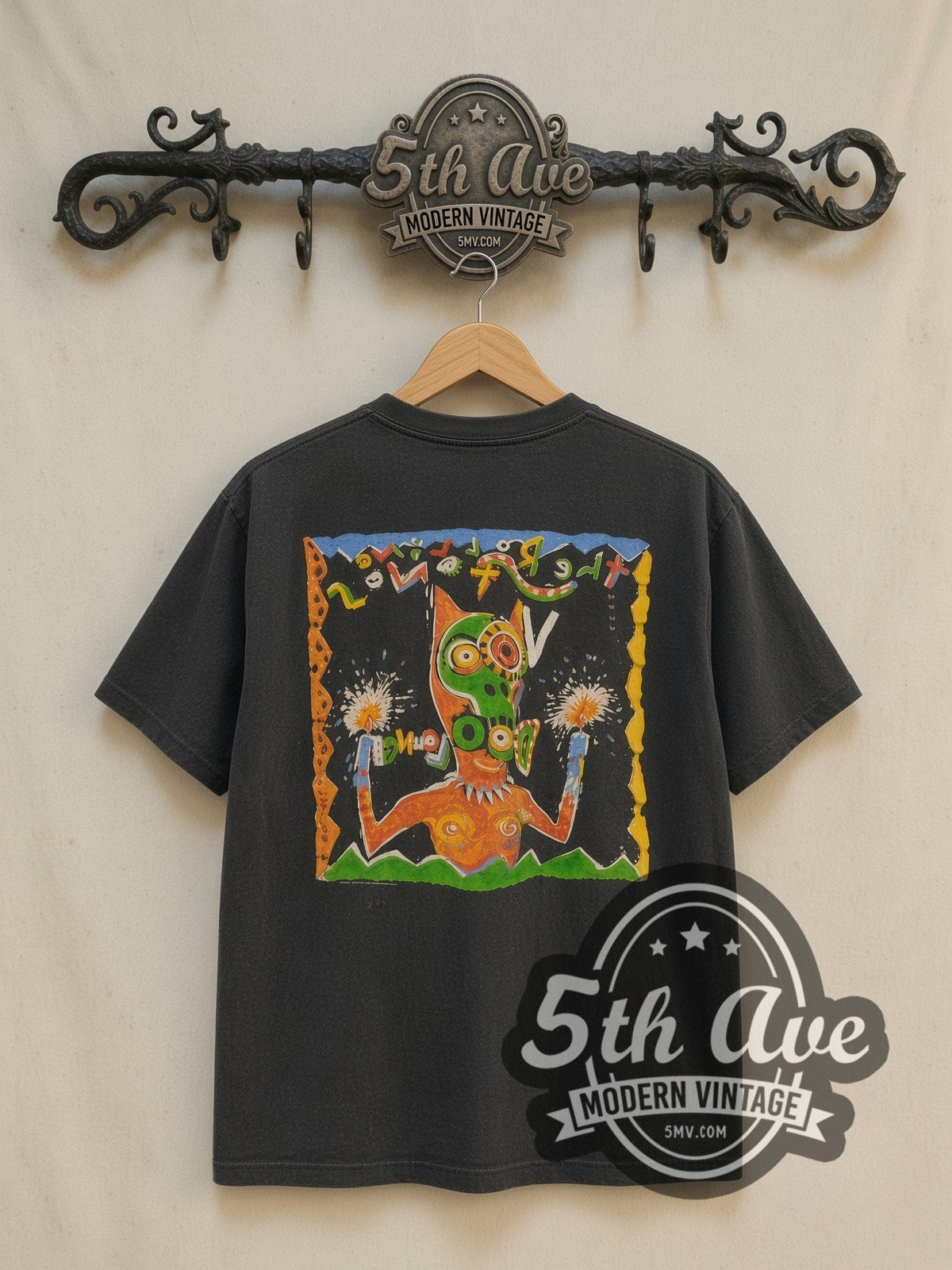 The Rolling Stones Voodoo Lounge World Tour 1994 vintage band t-shirt in black, back view on a display rack