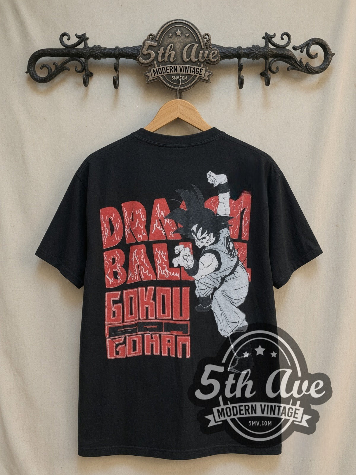 Dragon Ball Z Goku Super Saiyan all-over-print vintage graphic t-shirt, back view on a display rack