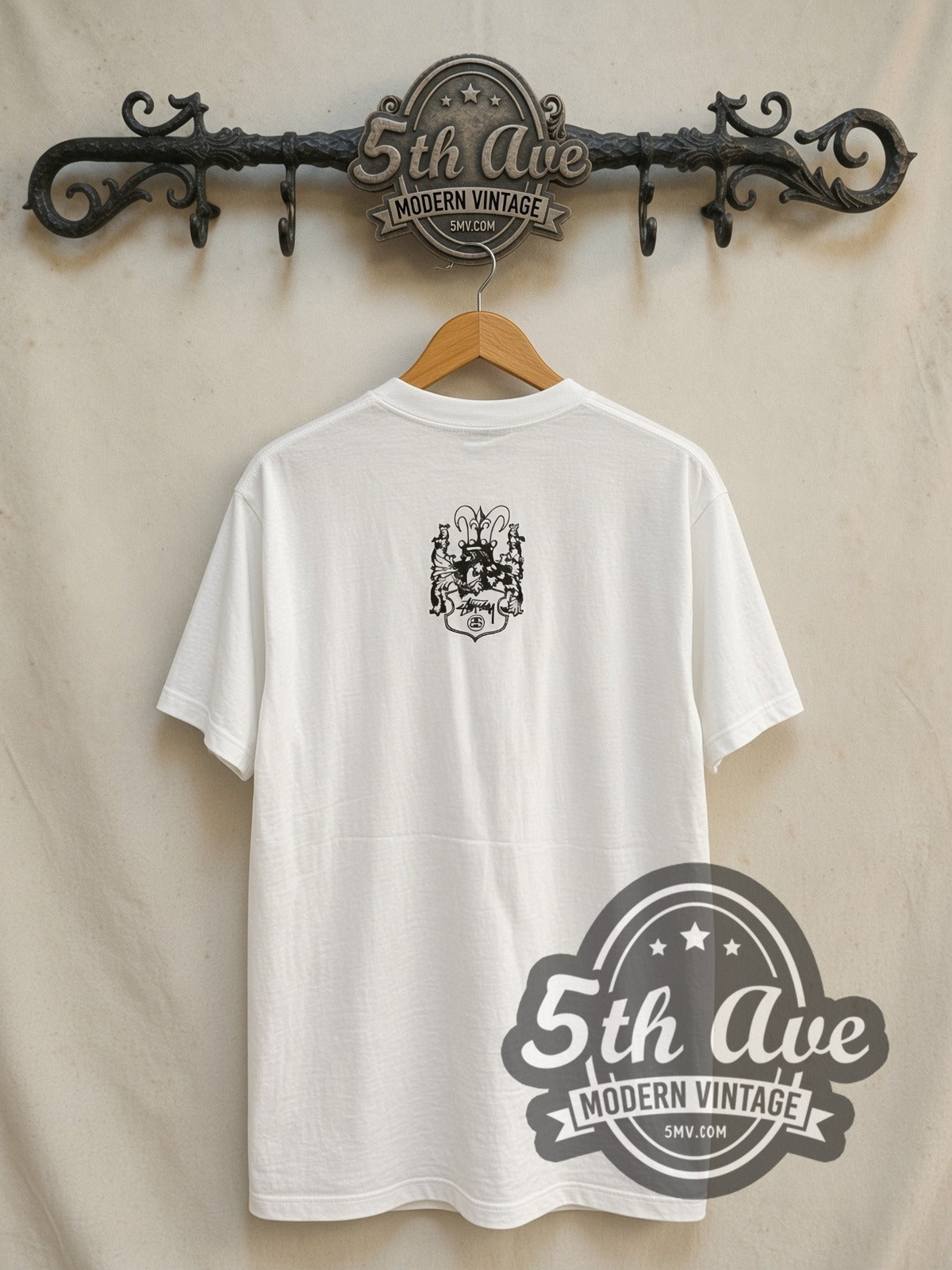 Youth Brigade x Stüssy Live Clean Stay Young vintage band t-shirt in white, back view on a display rack