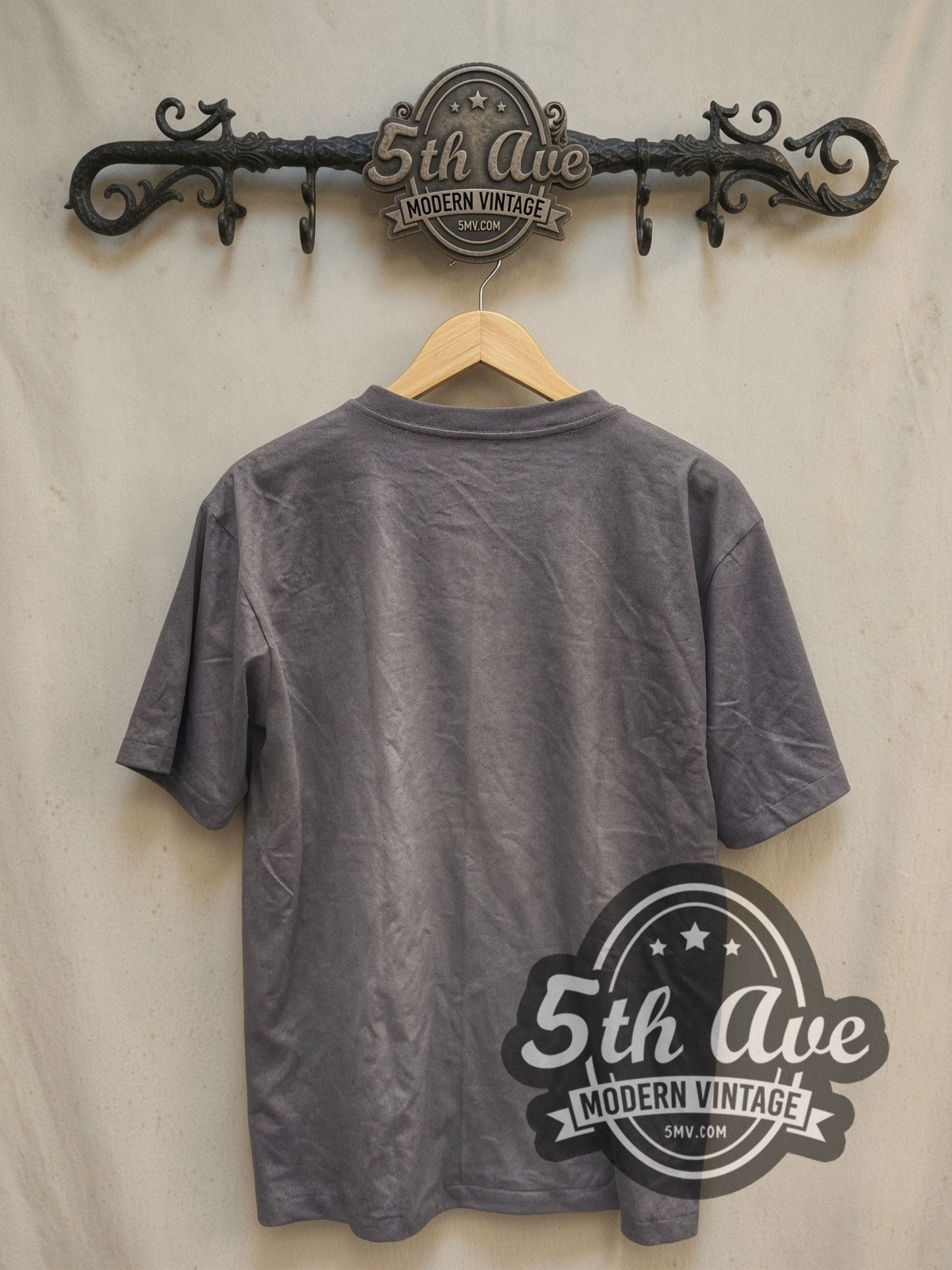 David Bowie Lightning Bolt Skull vintage band t-shirt, back view on a display rack