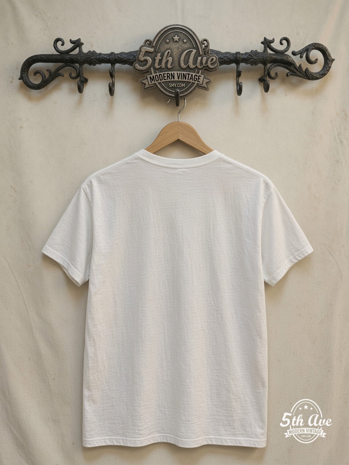 Led Zeppelin – Whole Lotta Love' White – Vintage Band T-Shirt — back on locked cream ornate 5th Ave rack