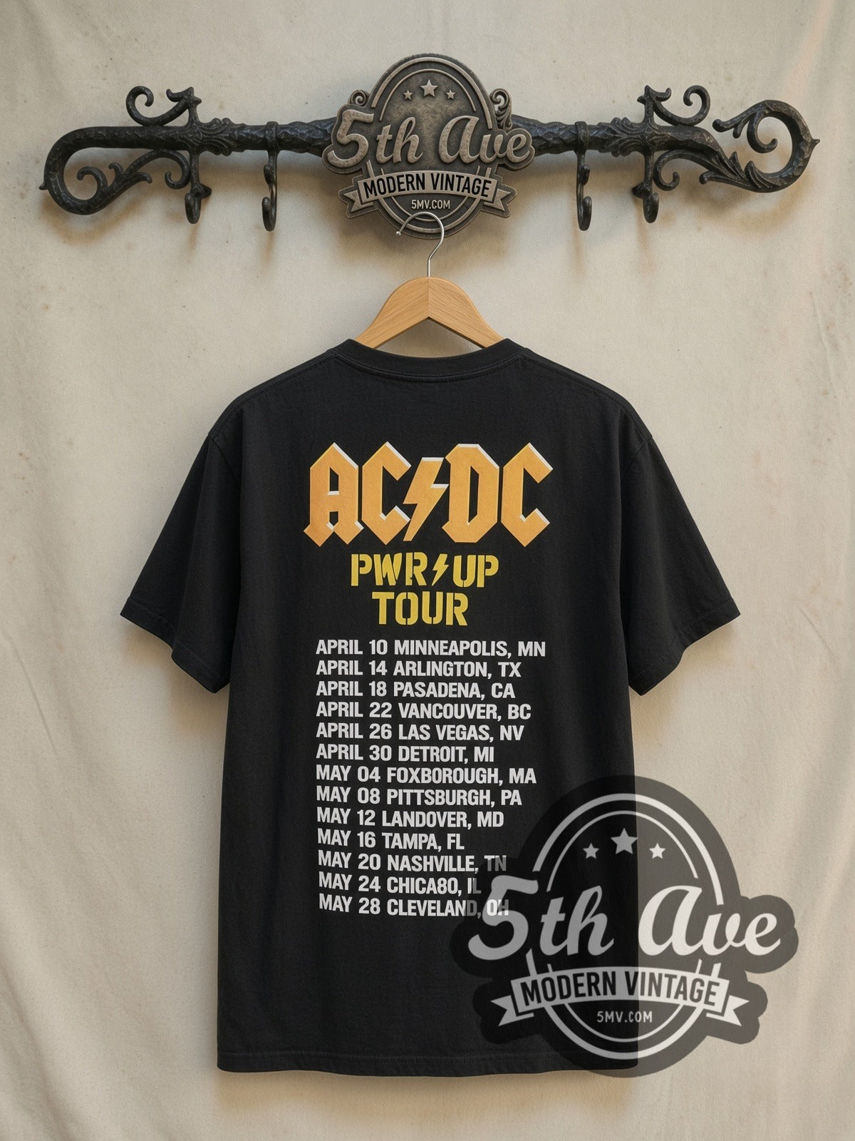 AC/DC Hells Bells Power Up Tour vintage band t-shirt in black, back view on a display rack