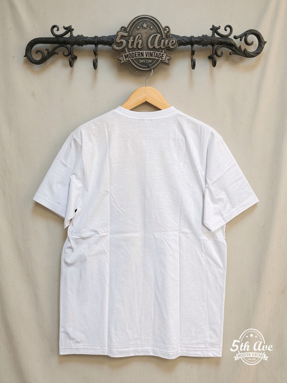 Leon The Professional Classic Film Graphic movie tee, back view on a display rack