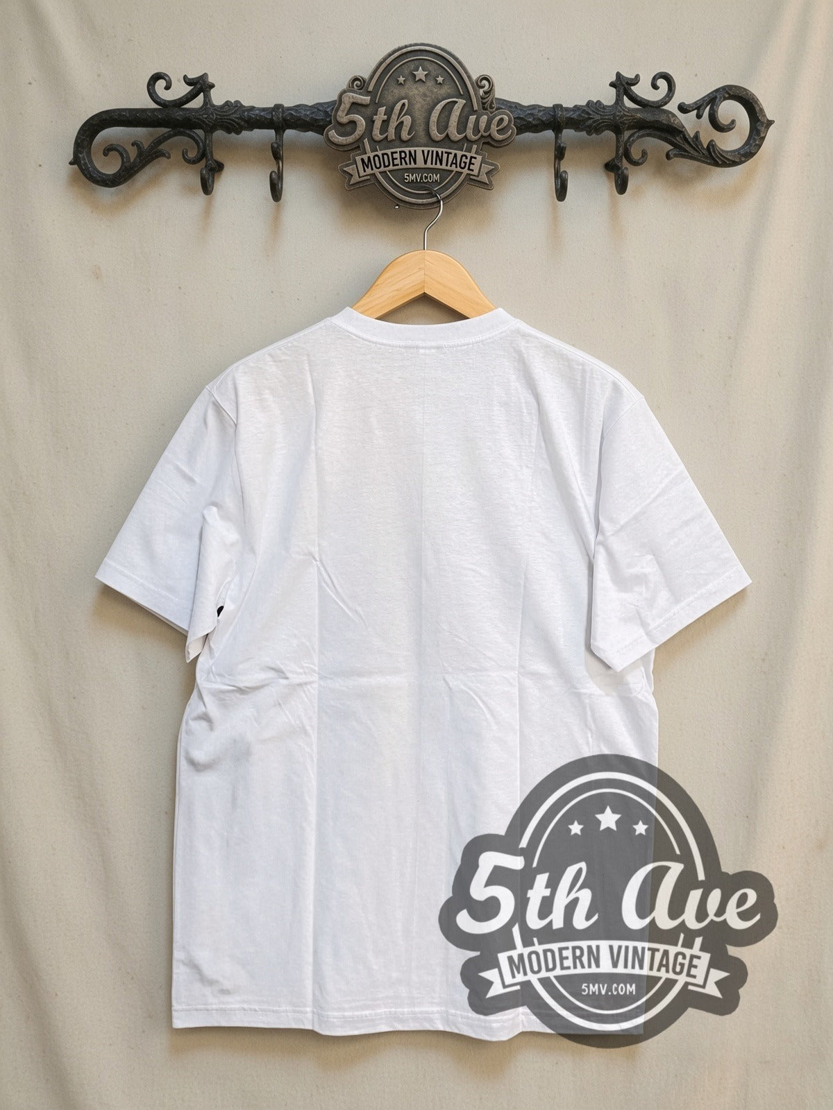 Leon The Professional Classic Film Graphic movie tee, back view on a display rack