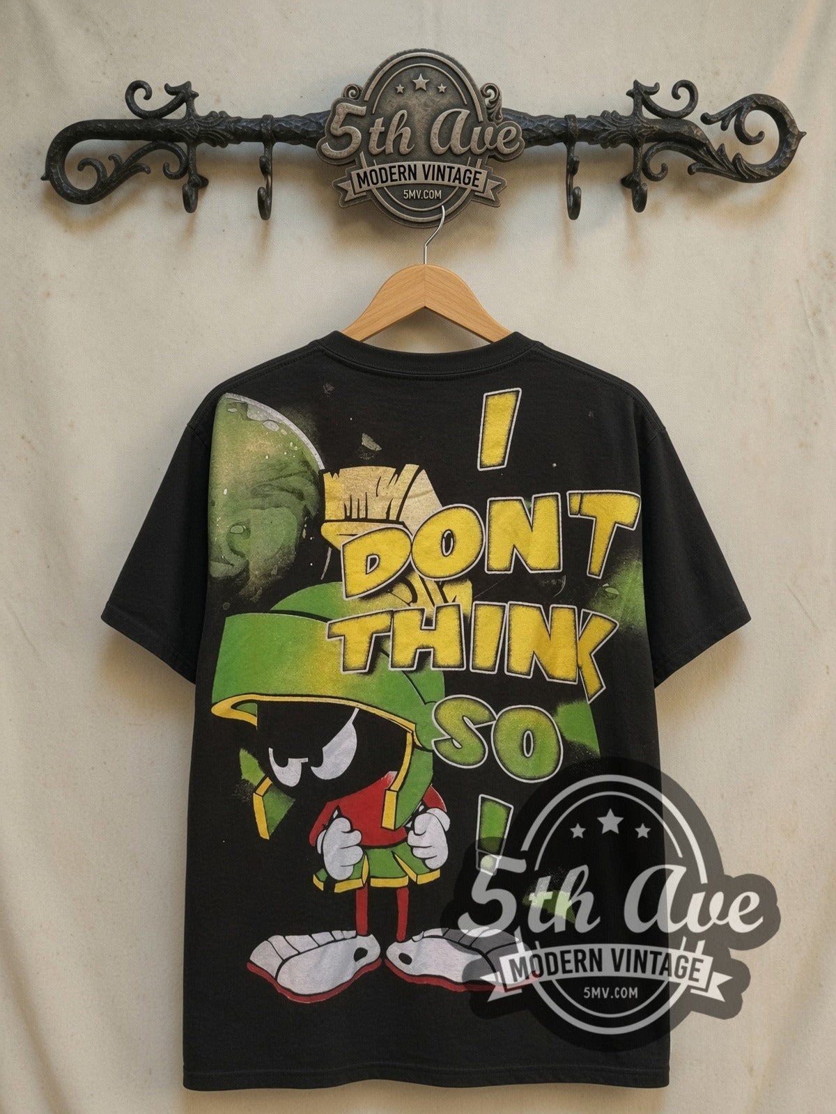 Marvin the Martian I Don't Think So graphic tee, back view on a display rack