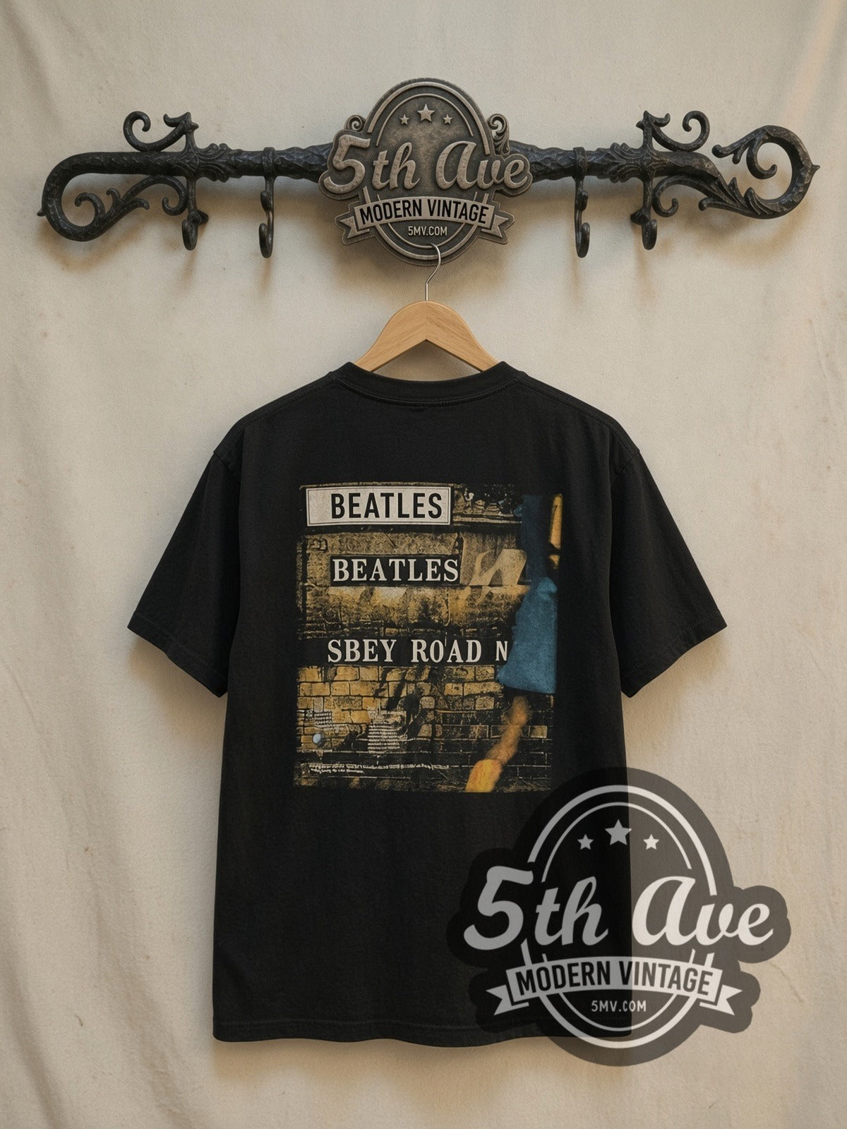 The Beatles Abbey Road Crossing vintage band t-shirt, back view on a display rack