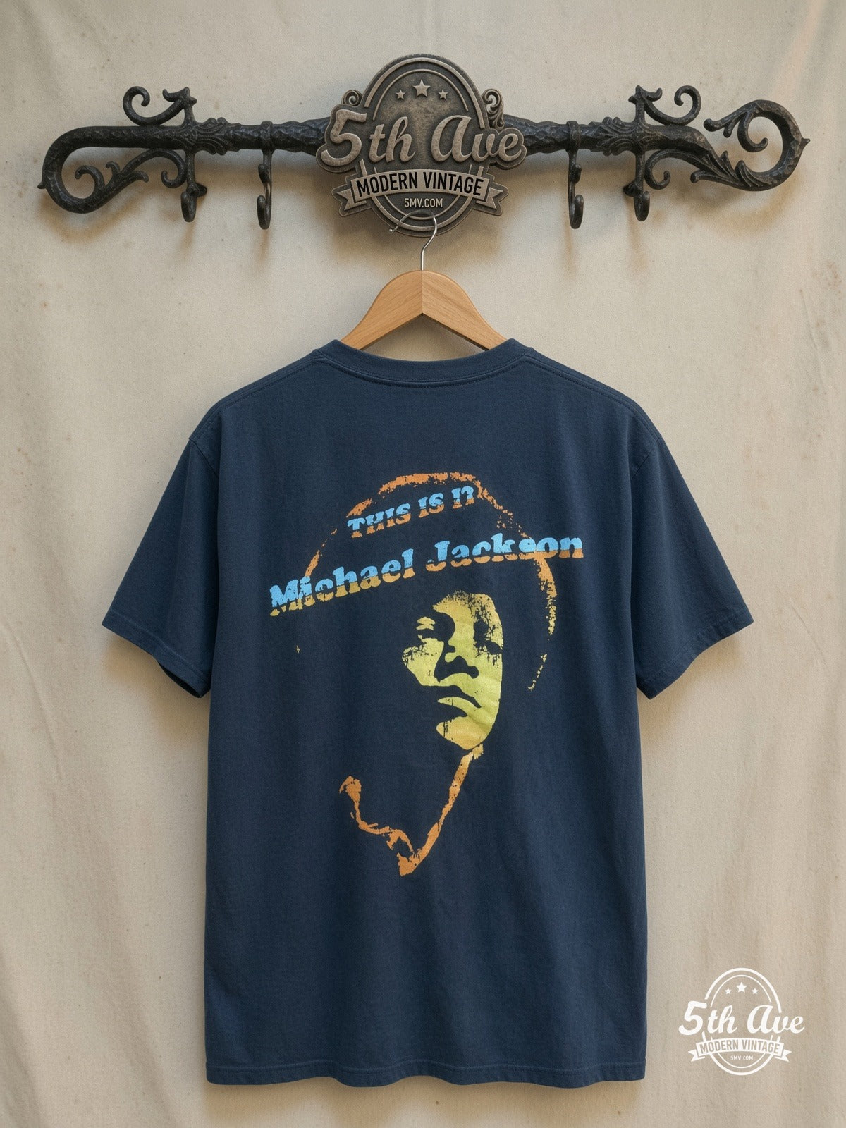Michael Jackson – This Is It – Vintage Band T-Shirt — back on locked cream ornate 5th Ave rack