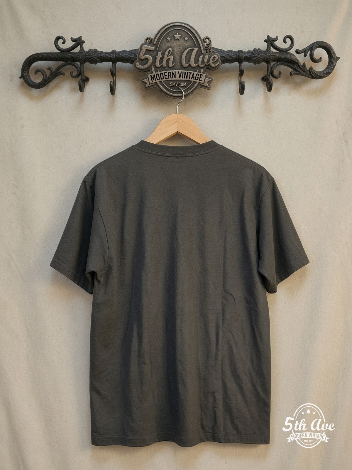 Pink Floyd – 100% Cotton New Vintage Band T-Shirt – Vintage Band T-Shirt — back on locked cream ornate 5th Ave rack