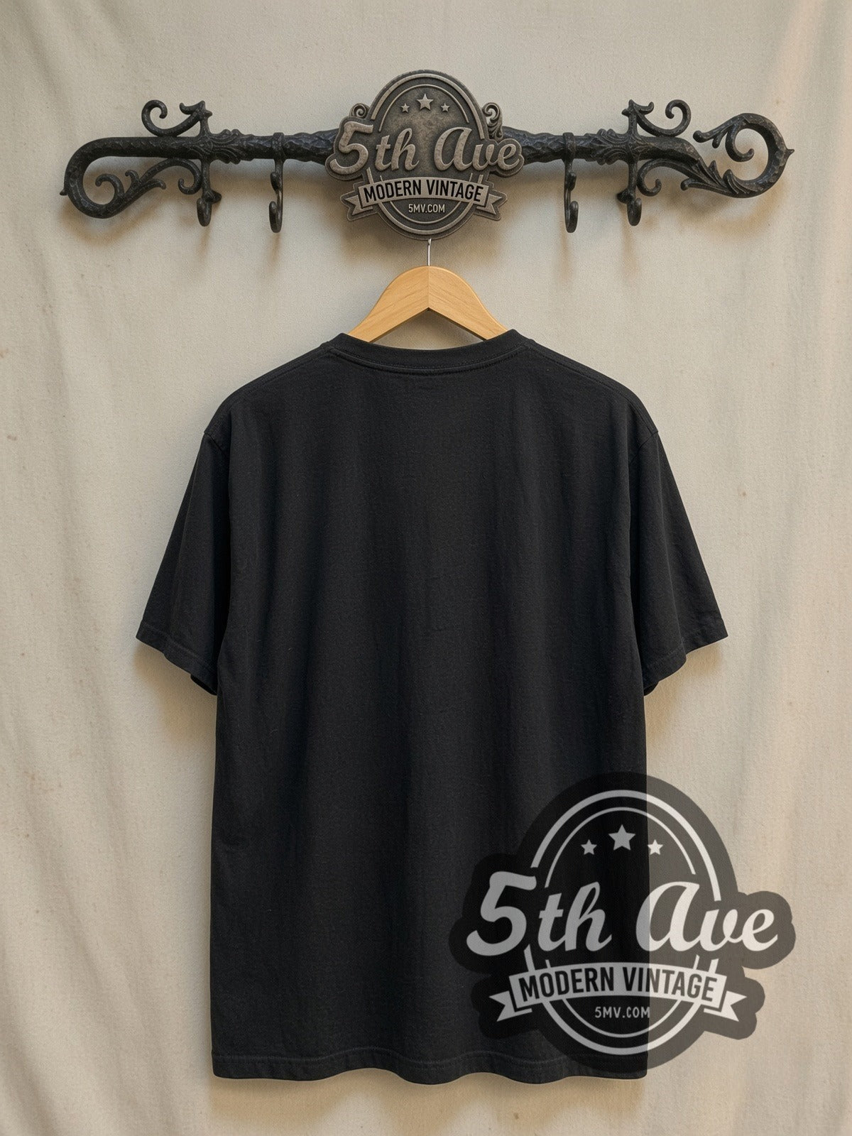 John Wick vintage graphic t-shirt, back view on a display rack