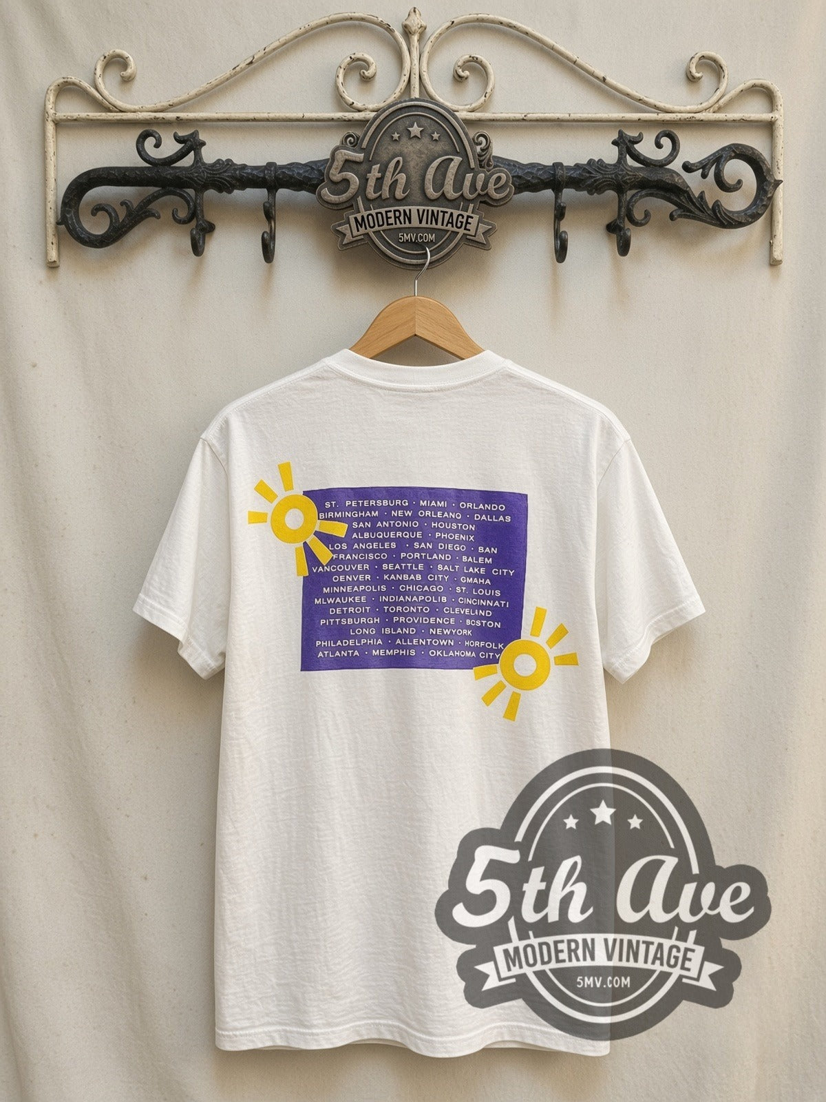 Butthole Surfers Children Think We Eat Flies vintage band t-shirt in white, back view on a display rack
