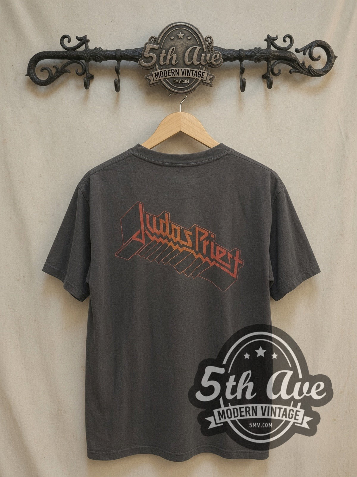 Judas Priest Robotic Eagle vintage band t-shirt, back view on a display rack