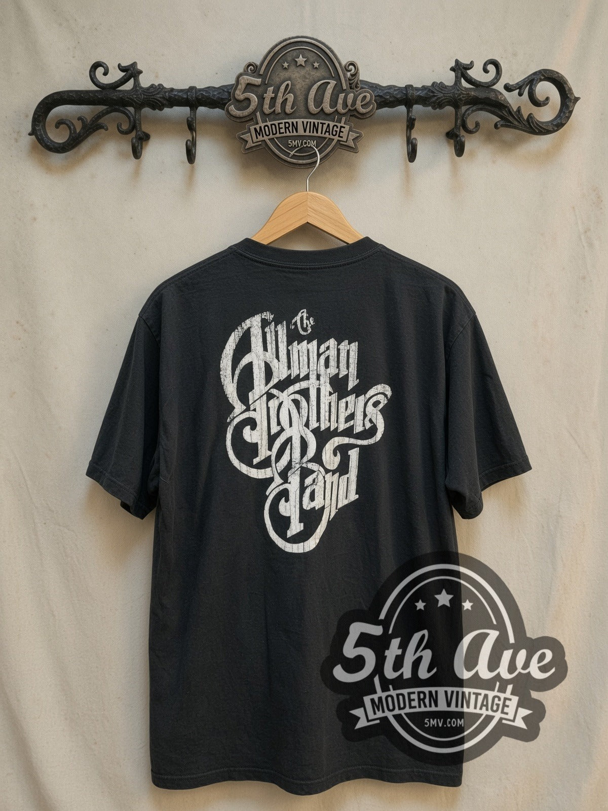 The Allman Brothers Band The Road Goes On Forever vintage band t-shirt, back view on a display rack