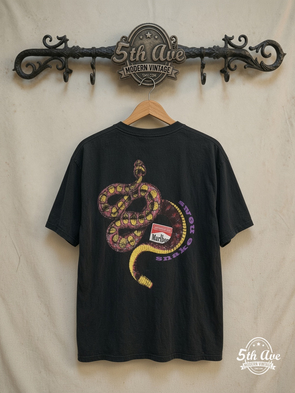 Marlboro – Rattlesnake – Vintage Graphic Tee — back on locked cream ornate 5th Ave rack