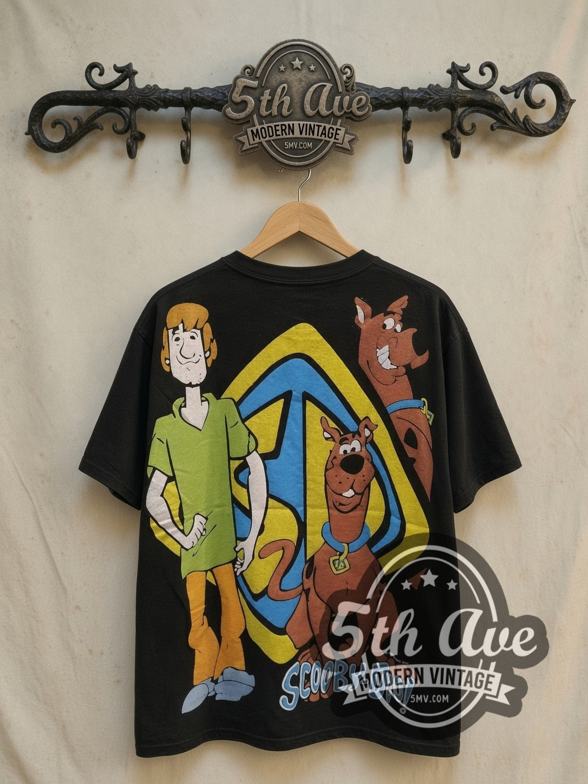 Scooby-Doo Munchies vintage cartoon tee, back view on a display rack